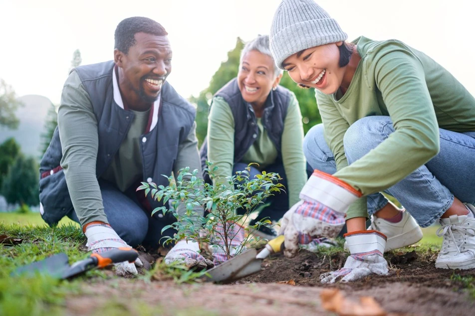 Men and women gardening